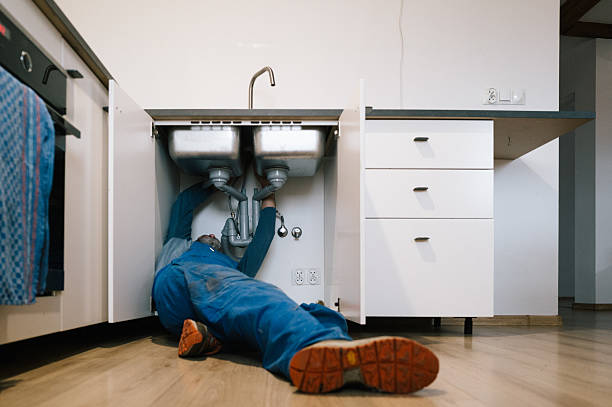 Professional Emergency Plumber technician working in Sunbury, PA